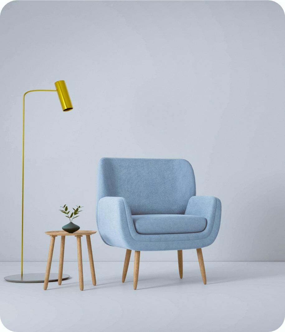 Image of a chair, lamp and table, a comfy place to chat